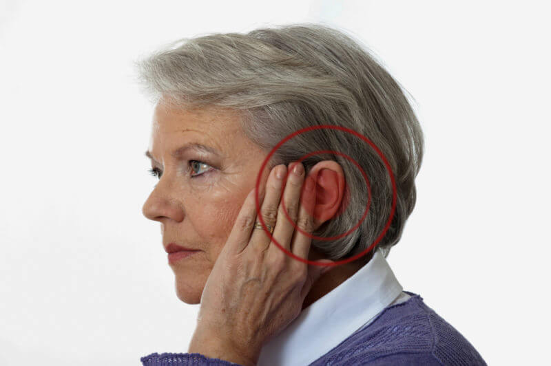 tinnitus ringing in mature woman's ear